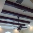 Stained beams in dining room